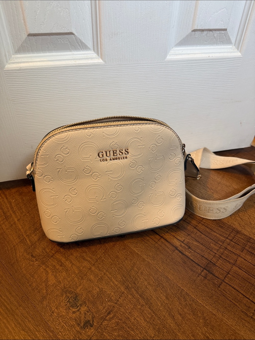GUESS Cream Embossed Logo Crossbody Bag with Branded Strap